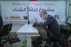 Local factories in Gaza make the warm clothes