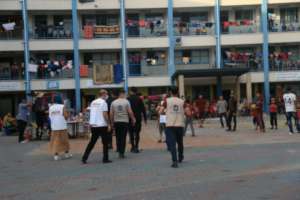 Visiting temporary shelters to provide aid