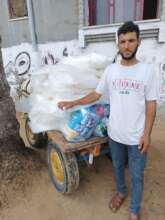 Distributing plastic sheets to keep out the rain