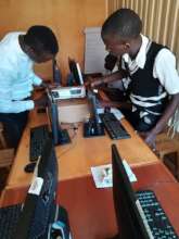 Kasubi students seting Projector for demostration