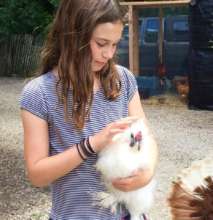 Lucy loves her rooster friend, Fiona!