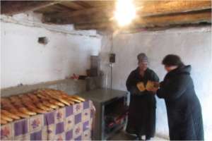 A young woman received equipment for baking bread.
