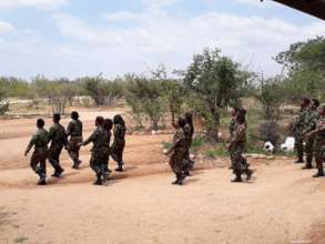 Mambas on parade with food to share.