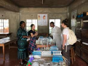 PWs discuss science equipment with staff