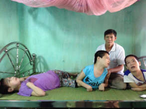 Mr Duc cares for his three paralyzed daughters