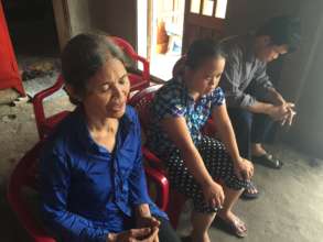 Mrs. An with her daughter Hoa and son Huong
