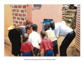 Resource persons demonstrating good hand washing