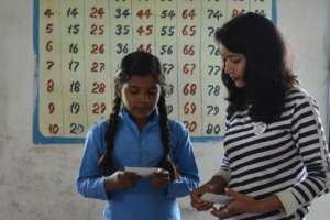 Girl child learning through GKP kits