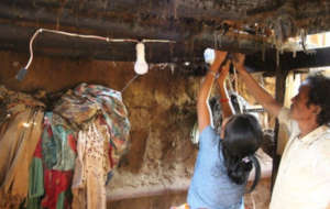 Installing solar light inside a village home