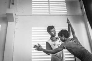 Ly dances together with a student who is blind