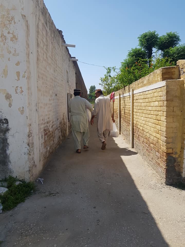 Volunteers with Food bag in the street