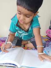 Srisha trying her hand at reading and writing