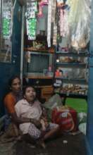 Shobha with Nandini - in her small store