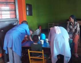 Kids sitting and ready for lunch