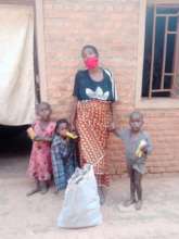 Young mother (21 yrs-old) of 3 kids, with food aid