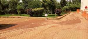Day after heavy rain brought mud into parking lot