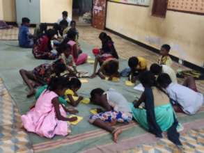 Children preparing Christmas Cards
