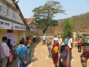 Parents in line for Food grains and Hygiene Kits