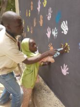 Children decorating the new child friendly spaces