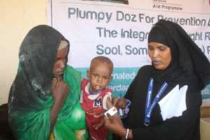 Malnourished Child Receives Nutripacket