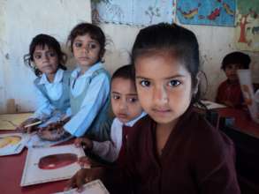 a group of children in arts class