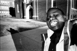 Self-Portrait In Front Of School