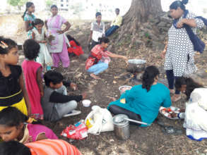 Camp and cooking meal in the open
