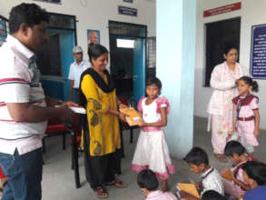 Distribution of Books and Notebooks in school