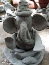 Lord Ganesha clay idol made by children