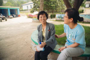 Dr Lee & patient on hep B treatment in Kaesong