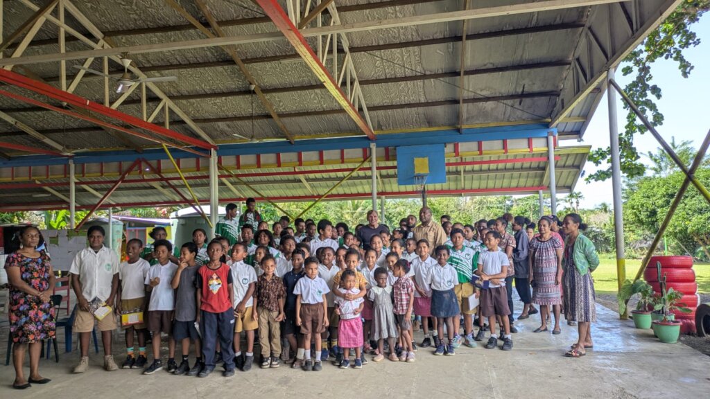 Giving talk at school in Milne Bay, PNG