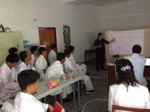 Dr Alice Lee training local physicians, DPRK