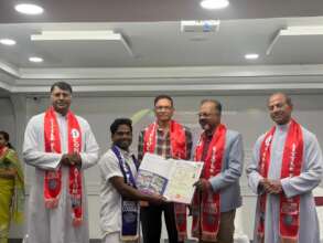 Chandappa receiving his degree.