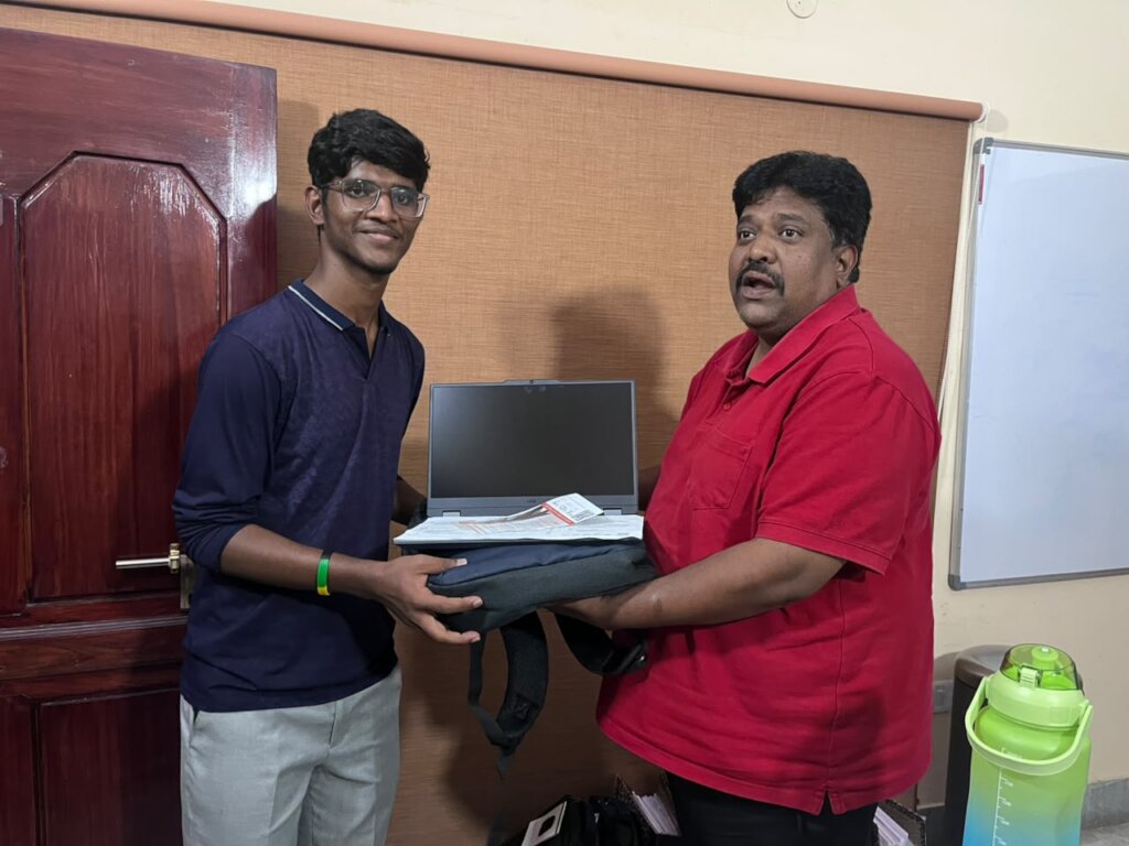 Sandeep with his new laptop