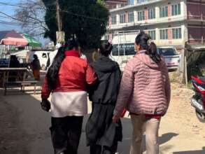 Rescue underway: a girl is led to safety