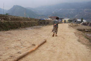 Boy working on a construction site