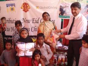 Distribute new clothes to one family for eid