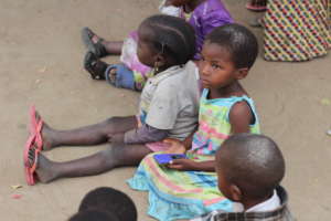 Children listening to the MP3forLife Player