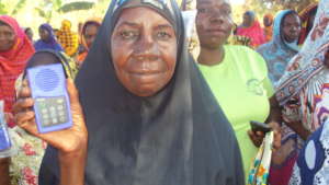 Rural Woman showing her MP3forLife Player