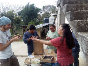 Preparing containers of wax to feed to the hive