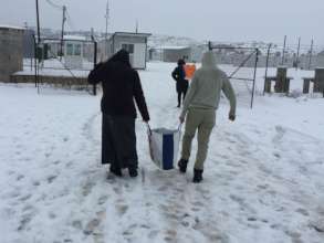 Carrying a food pack back to the shelter