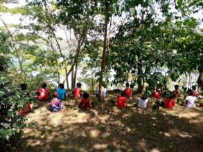The Tree of Knowledge with lake Nyinambuga at SgS