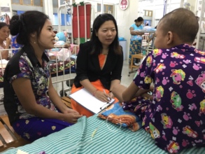 Child being given a bedside counselling session