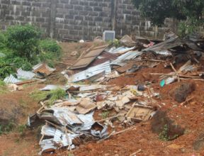 debris from zinc-sheet, crumbled shacks