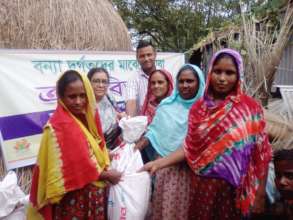 Dry food distribution in to affected Mother
