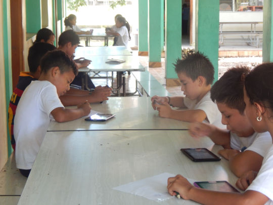 Children using technology at elementary school