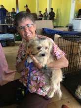 Volunteer Pam with one of our patients.
