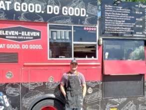 Rene in front of the Eleven-Eleven Food Truck