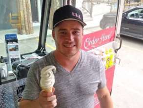Rene serving Eleven-Eleven Ice Cream