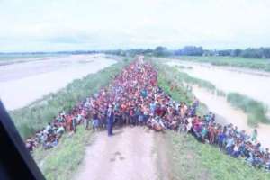 The flood victims sheltering along side the road